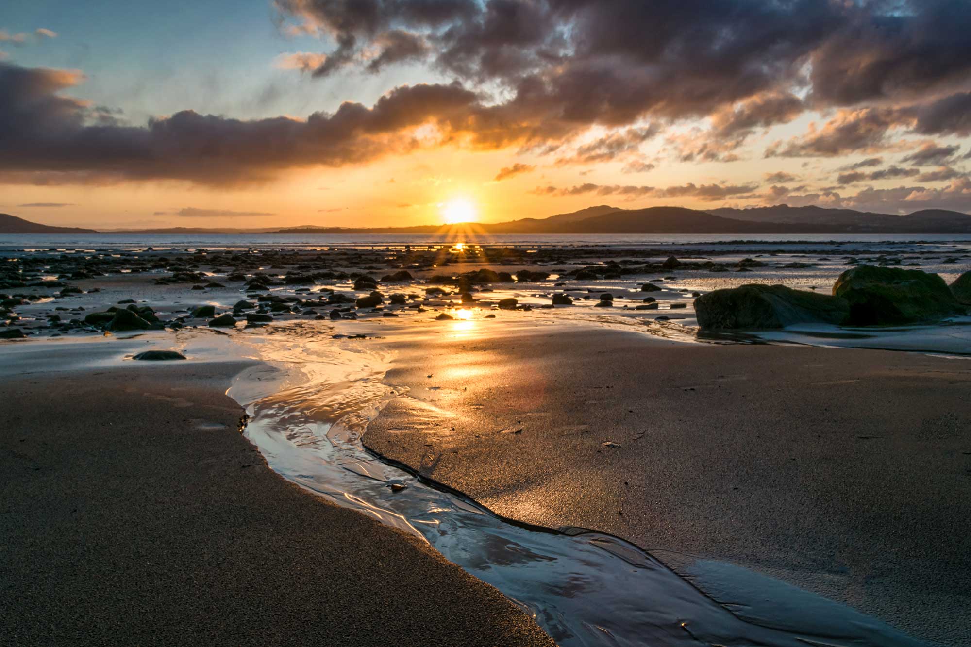 A sunset beach scene in Inishowen, County Donegal